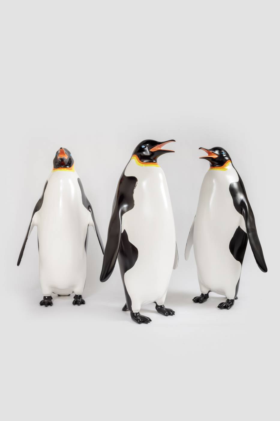 3 penguin sculptures